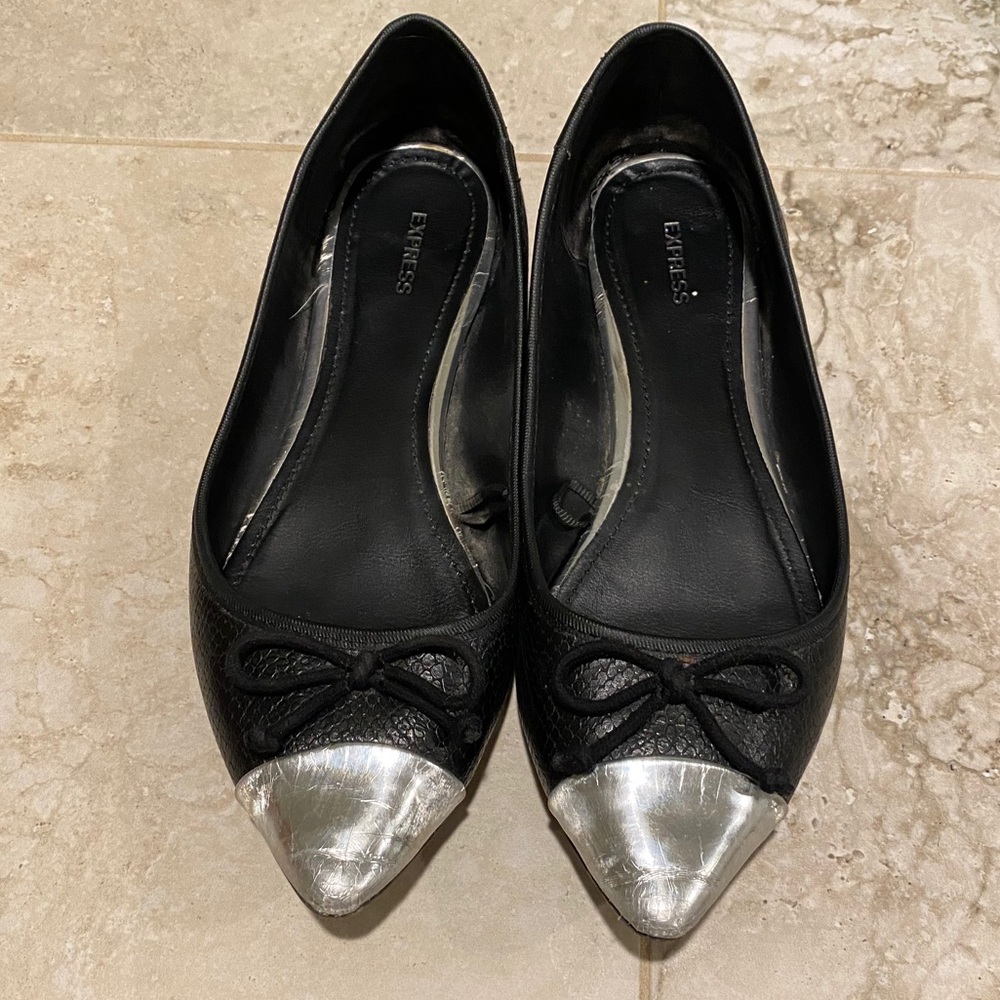 Black pointed flats silver tips